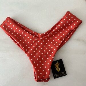 Brand new with tags Skatie orange polka dot thong cut bottoms